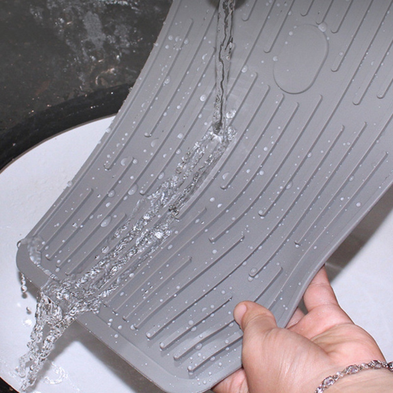 배수 패드를 고정하는 직사각형 버튼