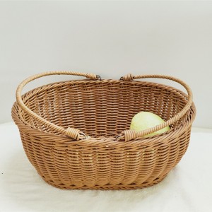 절묘한 손으로 래핑 된 타원형 등나무 바구니