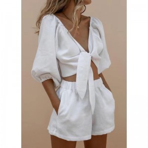 여성은 상단&반바지 세트를 레이스합니다